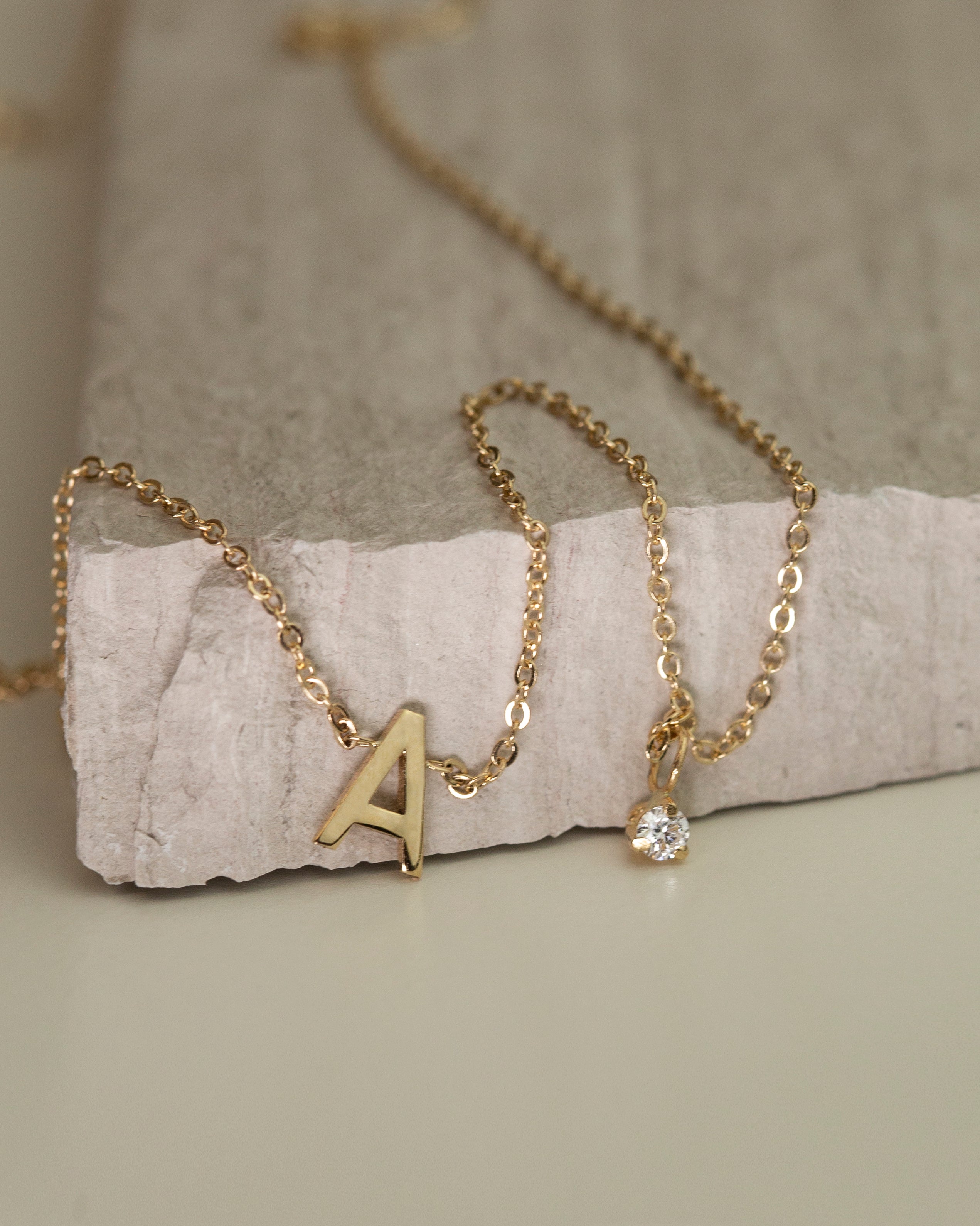 Personalized initial necklace with a diamond dangle