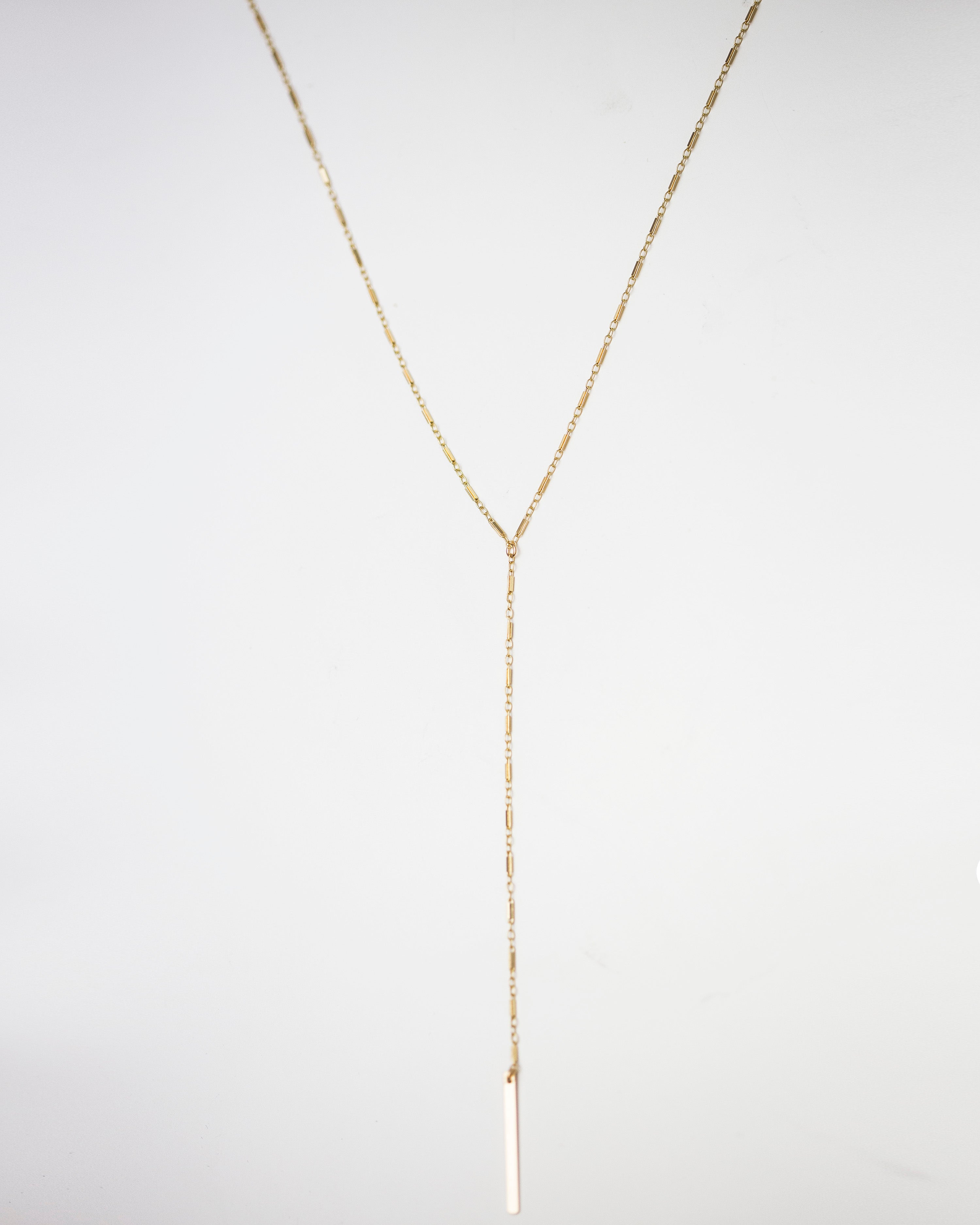 Must have in your jewelry necklace collection!
This bar chain Y lariat necklace goes perfect
with every outfit, dress up or down.