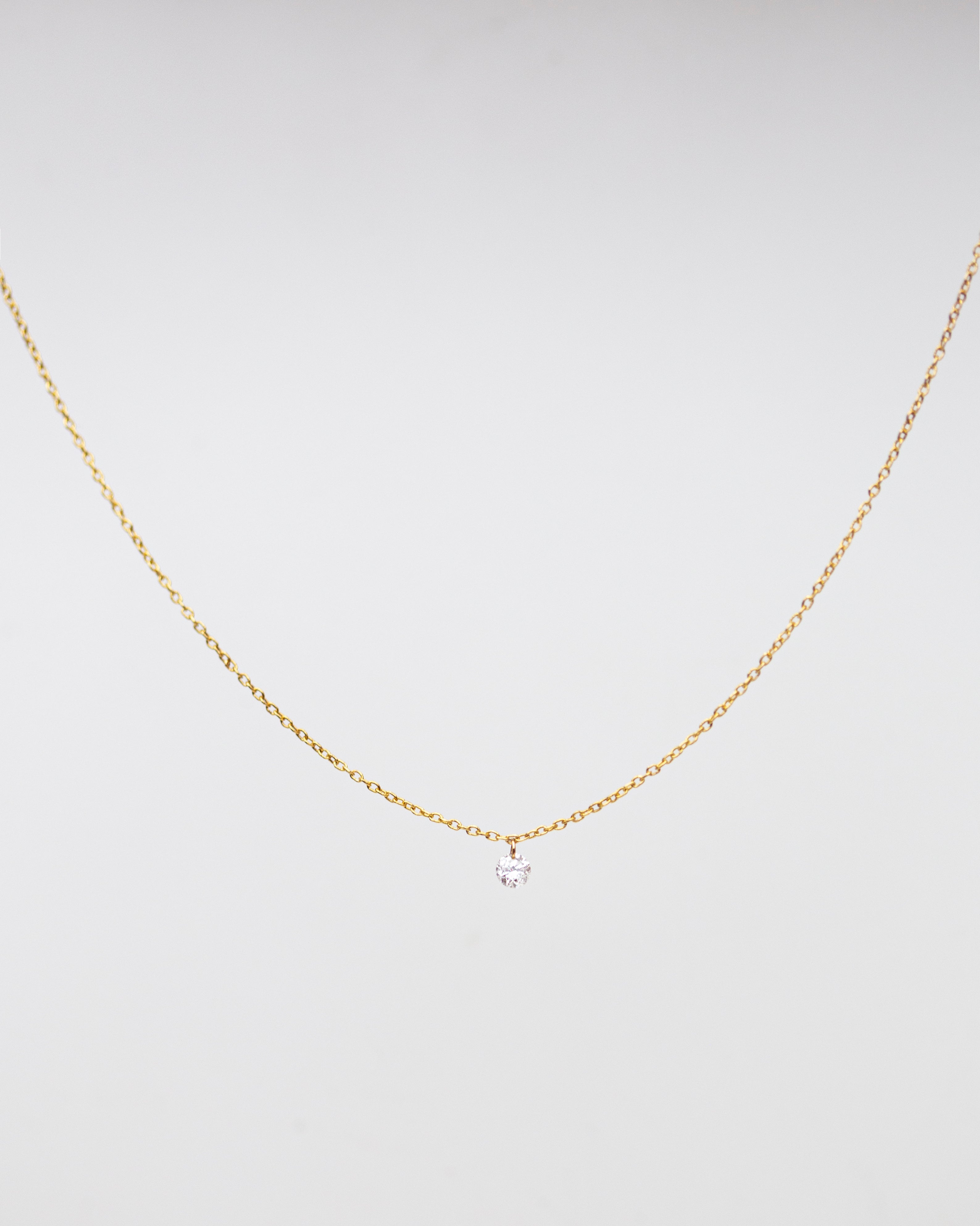 Necklace 14k Gold chain with beautiful diamond in a drilled jump ring setting 