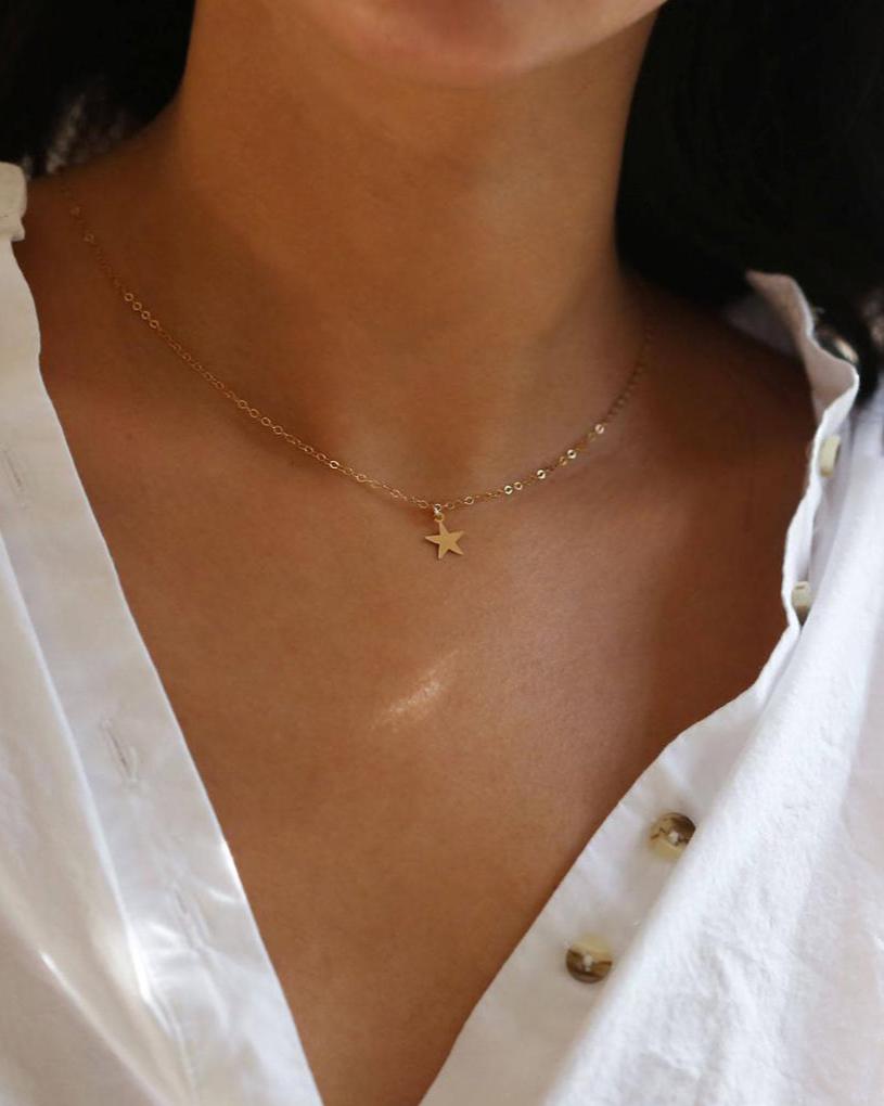 dainty star charm necklace in 14k gold 