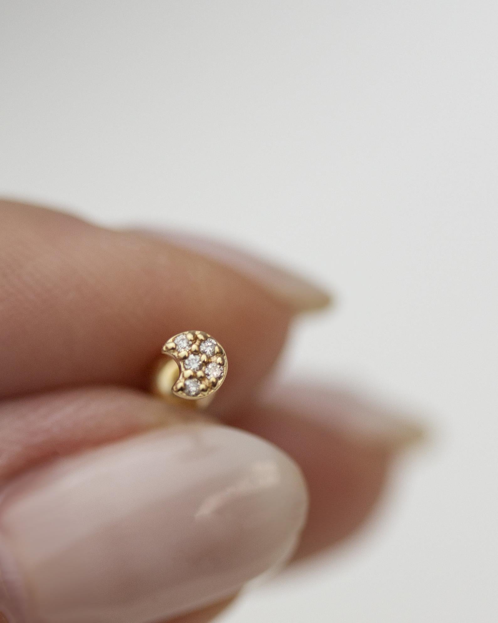 14K Yellow Gold crescent moon stud earring
Can be worn as stud for Cartilage.

Minimalist, high quality, and timeless.
Very secure and comfortable to wear.