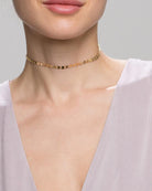 Indulge in the stunning elegance of our Coin Disc Choker, perfect for both a standalone piece or layered with other necklaces for a rich and bohemian look.