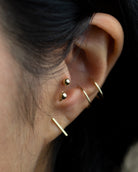gold earrings by E&E
