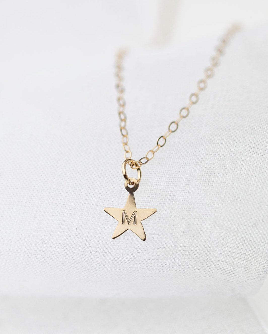 initial engraved gold star necklace 