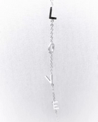 Customize your 14K solid gold initial bracelet. An understated, sleek everyday accessory. Ideal for gifting your loved one.