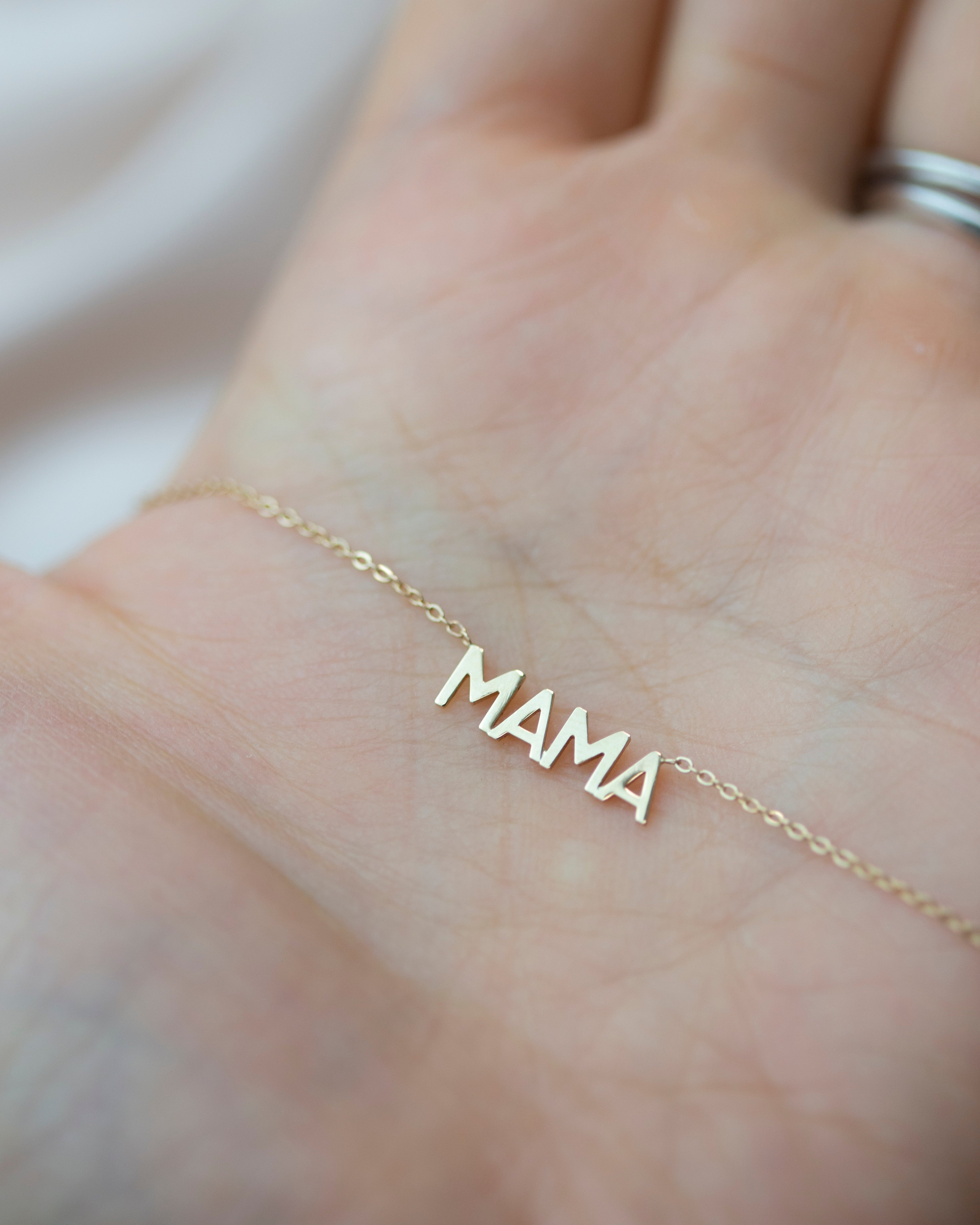 n celebration of all the great mothers around the world, the mom in your life to this piece of jewelry they deserve with this gold mama necklace.

A perfect way to express what means most to you!

Dainty minimalist everyday necklace