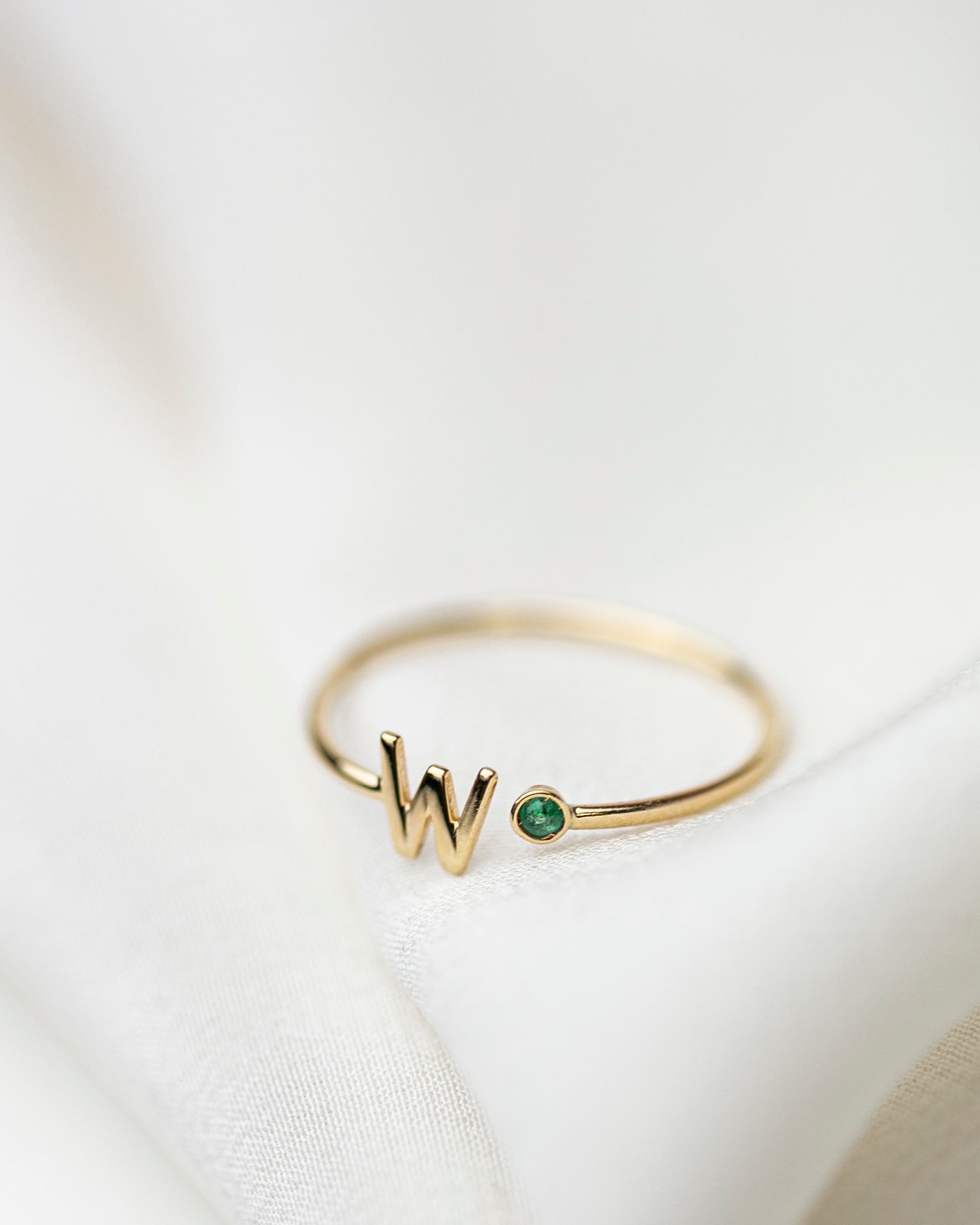 

Elevate your style with our exquisite 14k Gold Initial Ring, adorned with a birthstone of your choice. Personalize it with an Uppercase letter A-Z, making it a one-of-a-kind piece. A thoughtful and luxurious gift for yourself or someone special.