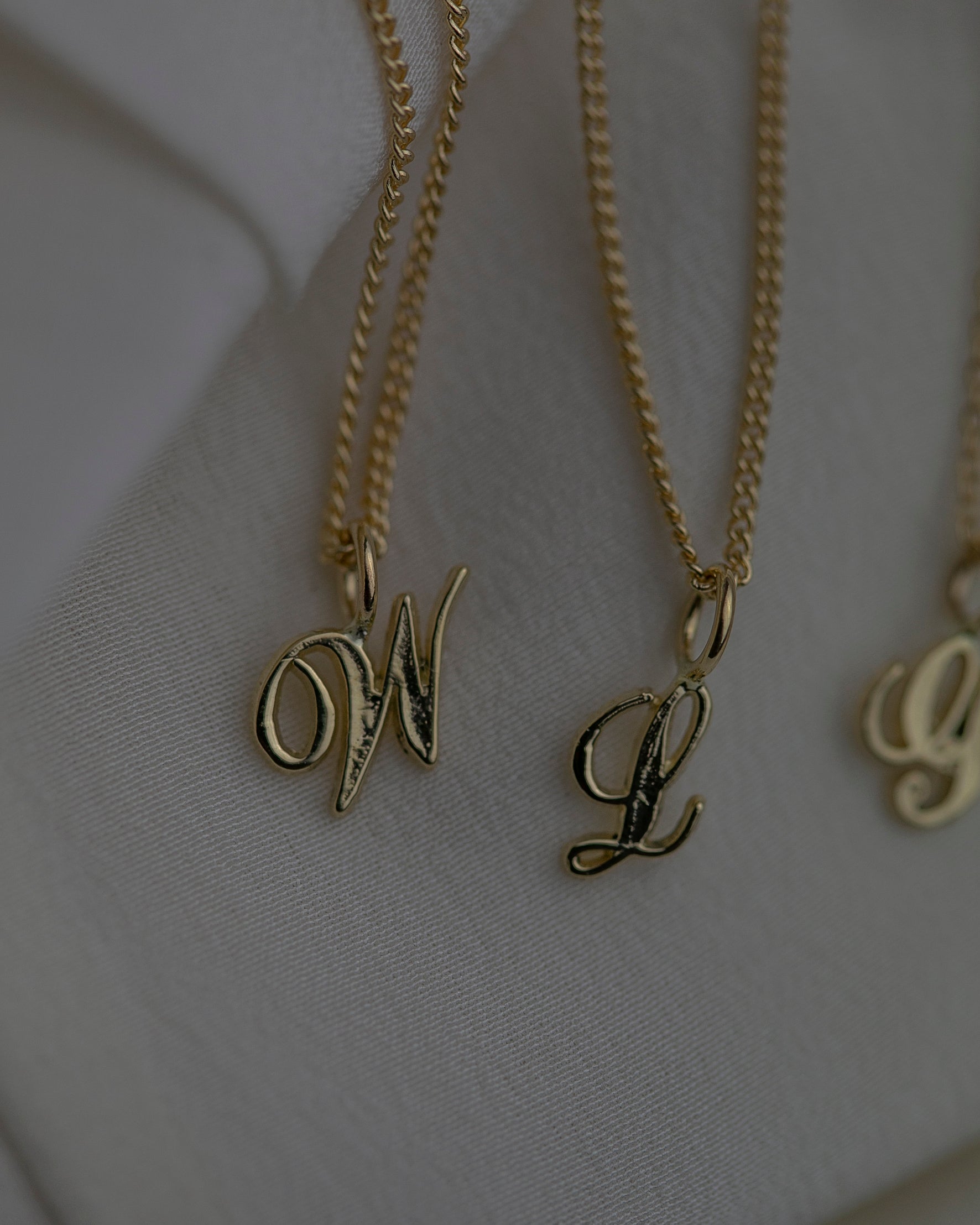 Gold initial necklaces