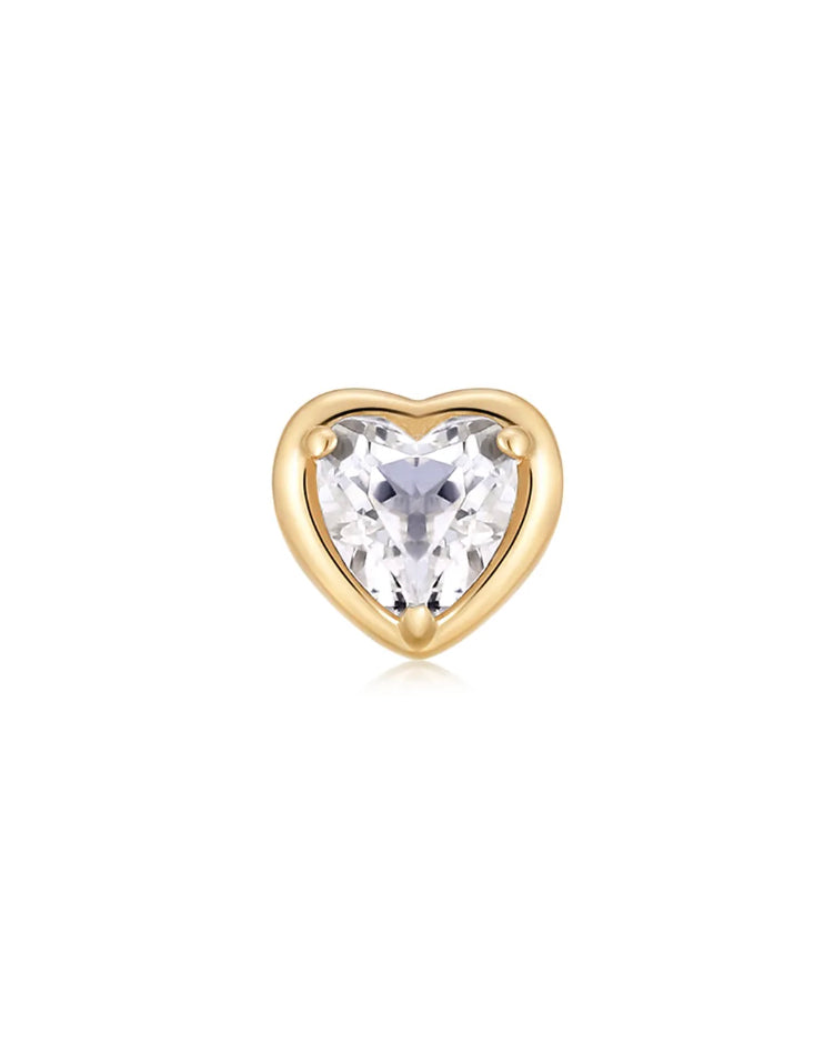 This 14k Heart White Topaz Stud Earring offers unique minimalism and superior craftsmanship for a timeless look. It has a screw flat back for extra security and comfort.

Minimalist, high quality, and timeless.
Very secure and comfortable to wear.